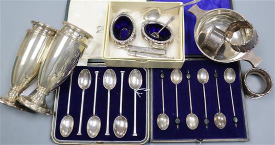 A silver two-handled dish, two sets of cased spoons, a pair of silver vases (weighted) and sundry small silver